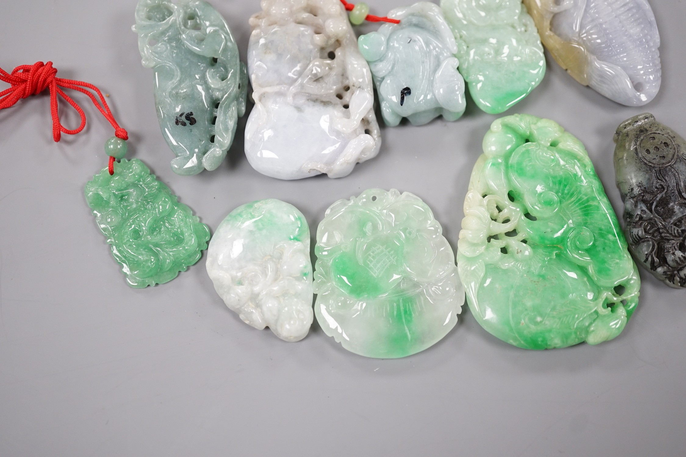 A group of ten jadeite and hardstone carvings and pendants